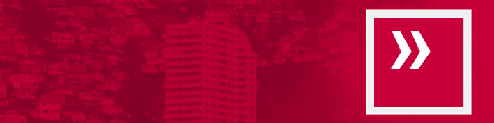Rectángulo con paisaje de edificios y casas con filtro color rojo, a la derecha está el logo del Boletín Desafíos: dibujo en líneas blancas de un cuadrado con dos flechas en su interior