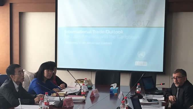 Mario Cimoli, Director of the Production, Productivity and Management Division of ECLAC (far right) during his presentation in Beijing