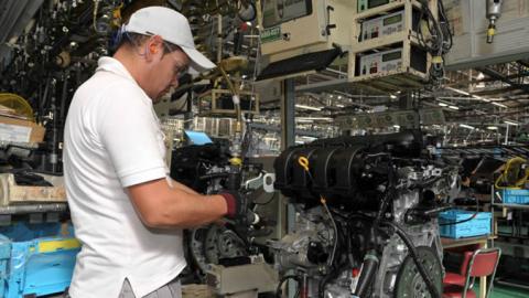 Photo of a worker in a factory