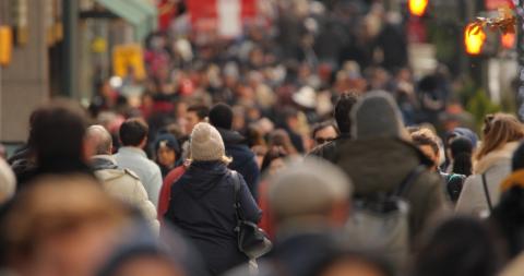 Photograph of people walking.