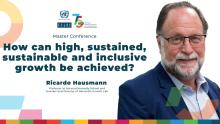 Meeting banner with Ricardo Hausmann's photo.